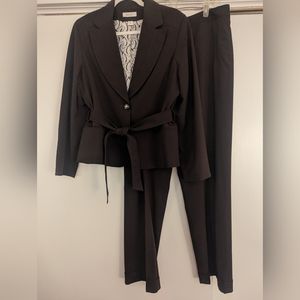 Women's traditional brown pantsuit